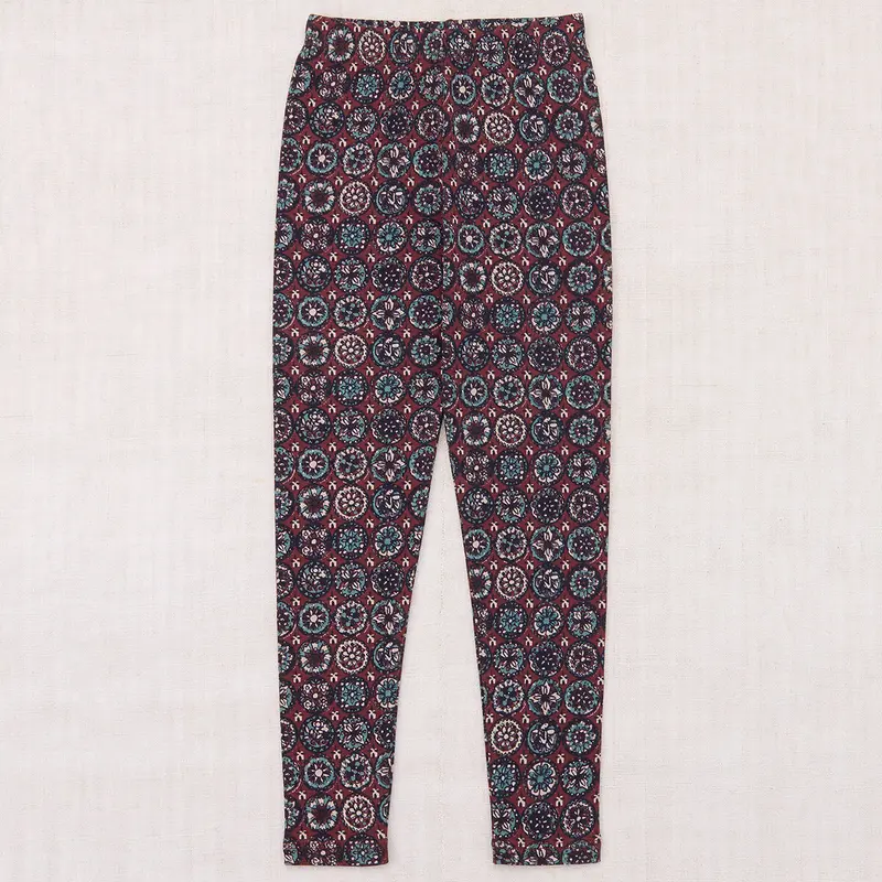 Legging in Madder Root Folk Tile by Misha & Puff