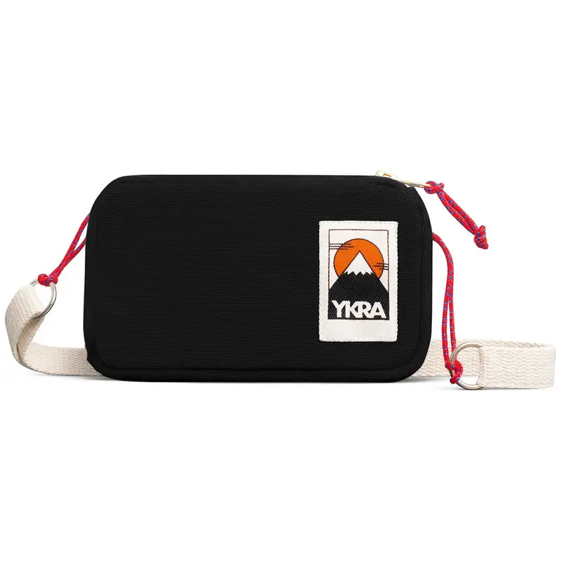 Travel Case in Black by YKRA