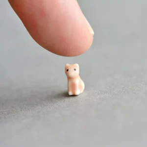World's Tiniest Cat Porcelain Figure by Camp Hollow