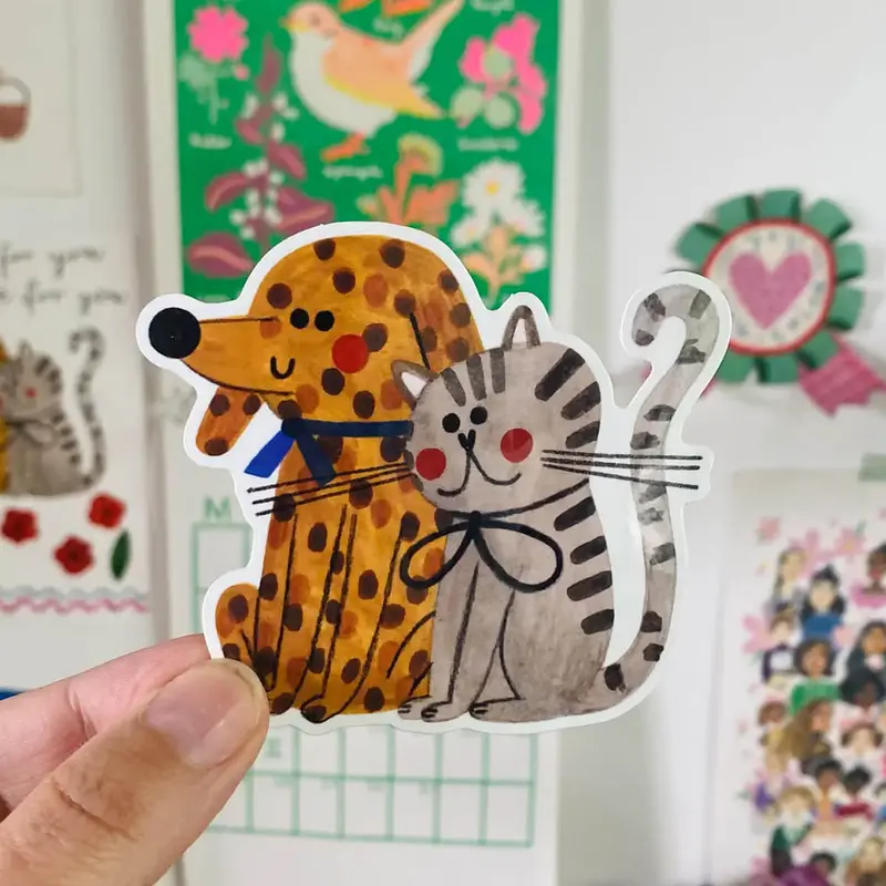 Cat & Dog Sticker by Daria Solak Illustrations