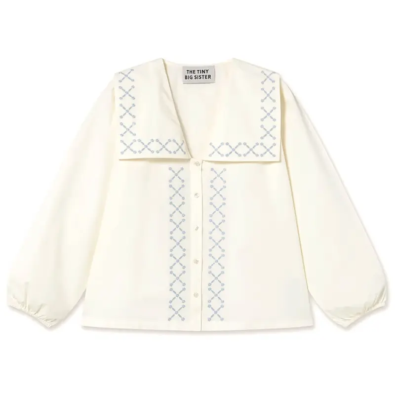 Cross Flower Embroidered Blouse in Off White by The Tiny Big Sister